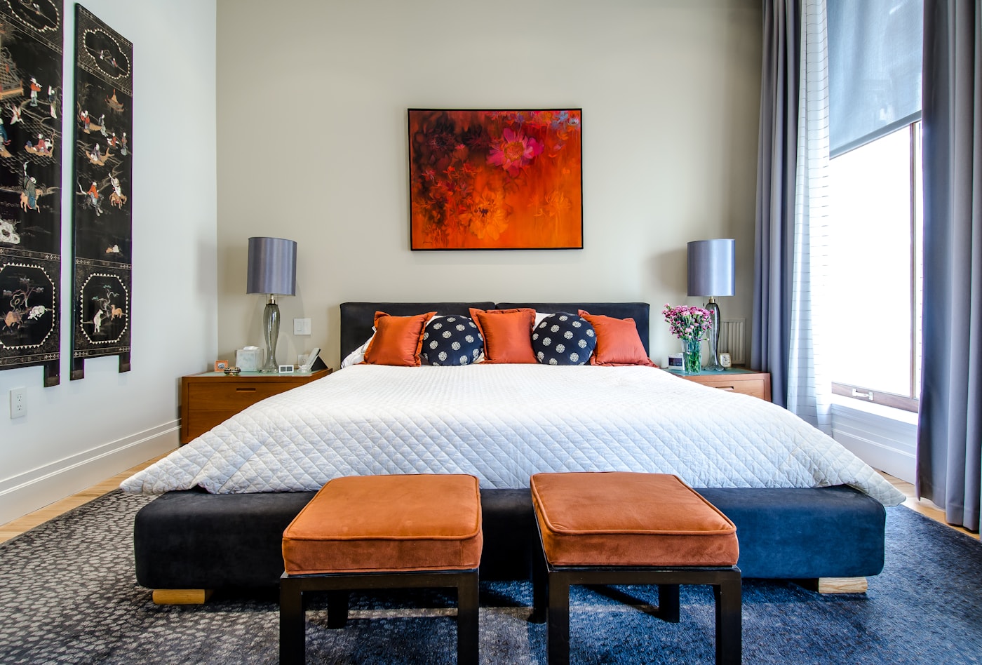 A practical bed & bath scene in a lived-in home